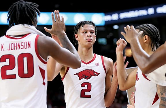 Arkansas Razorbacks forward Trevon Brazile celebrates with teammates as he leaves the game in the second half against the San Jose State Spartans at Bud Walton Arena